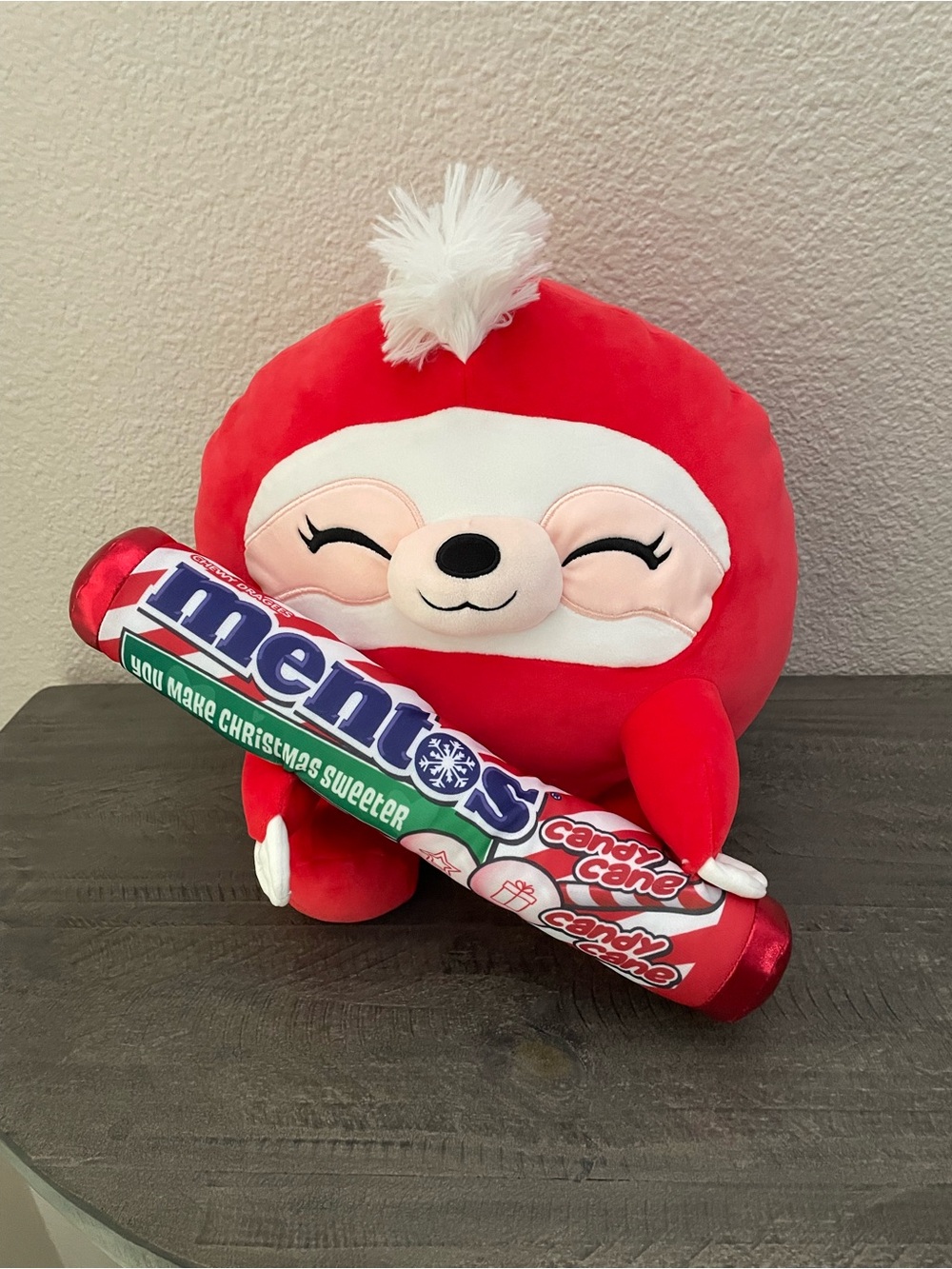 Red Plush Sloth Holding Mentos Candy Cane